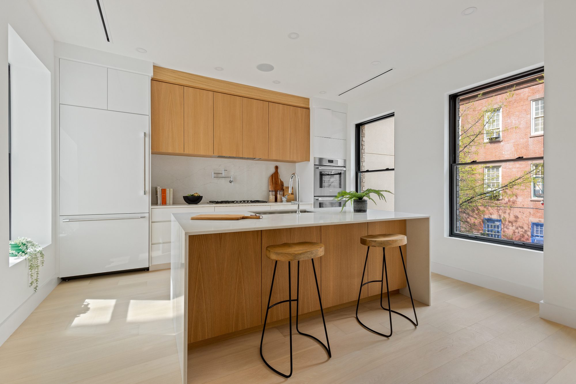 522 State Street — kitchen with oak island and bar stools