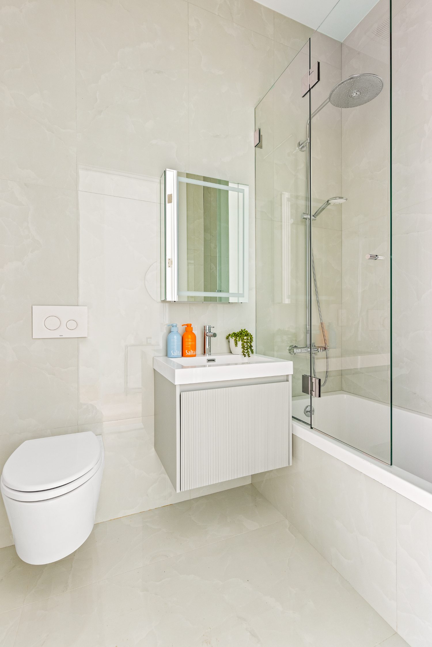 522 State Street — onyx-tiled bath with rain shower