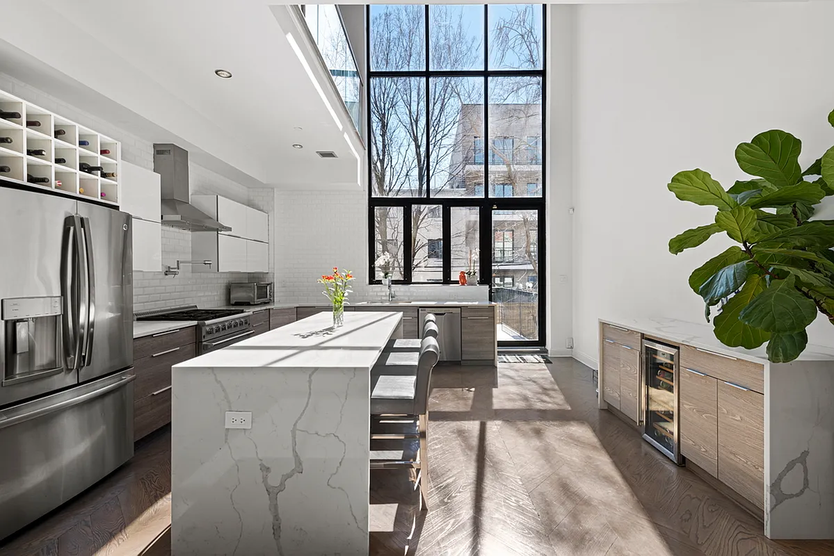 Throopkin Kollection — 272 Kosciuszko kitchen with double-height ceiling
