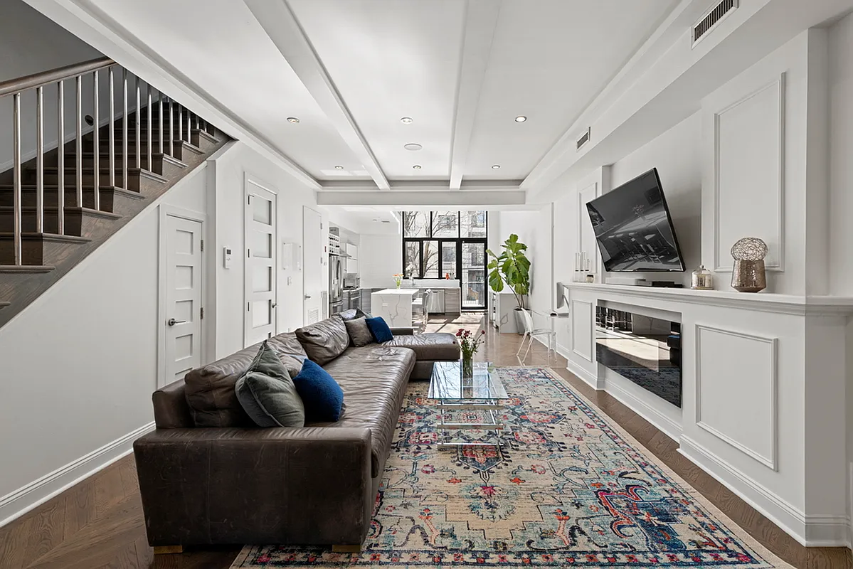 Throopkin Kollection — 272 Kosciuszko living room with fireplace and staircase